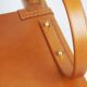 Leather armchair by Jacques Adnet