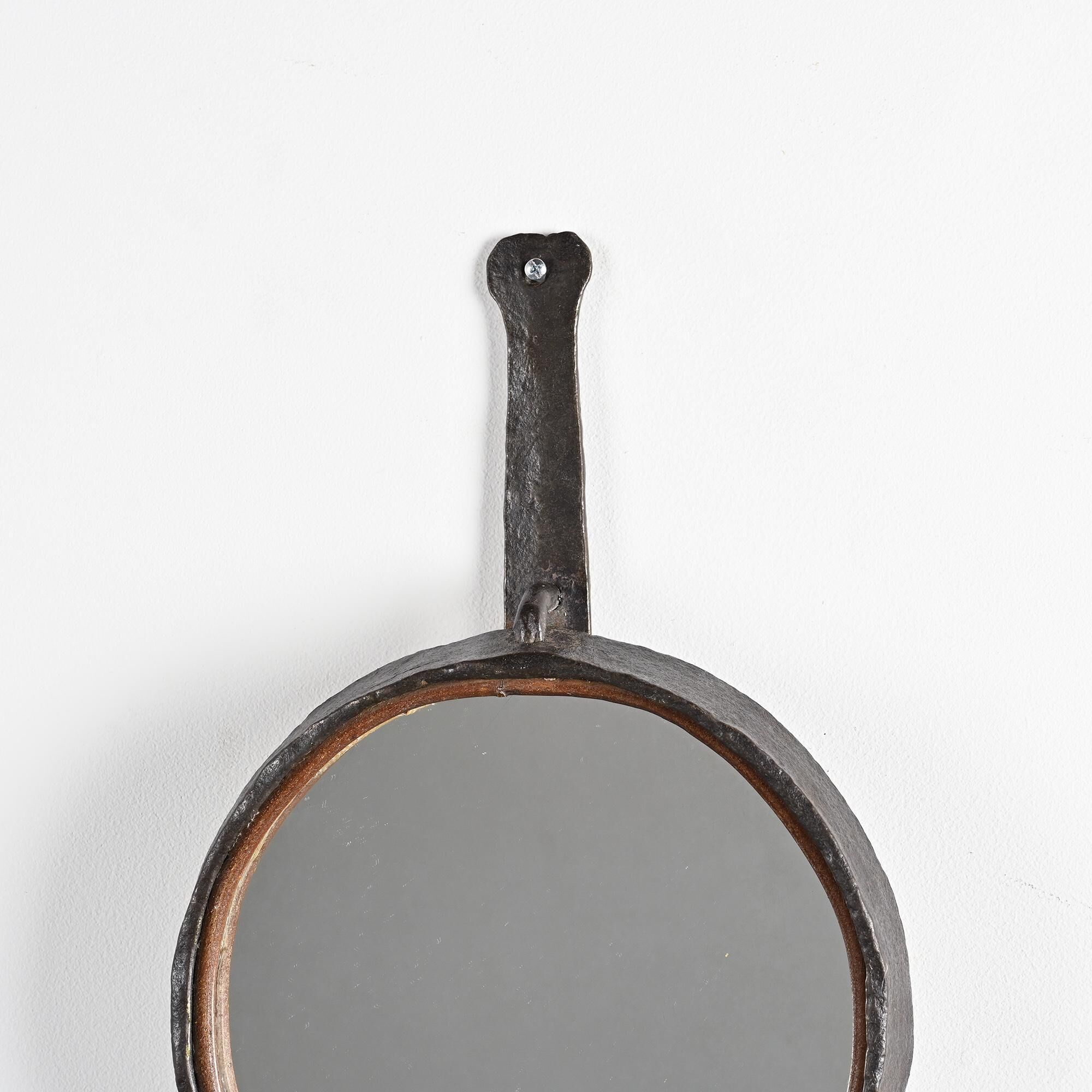 Wrought iron mirror by Léopold Gest, France, circa 1970.