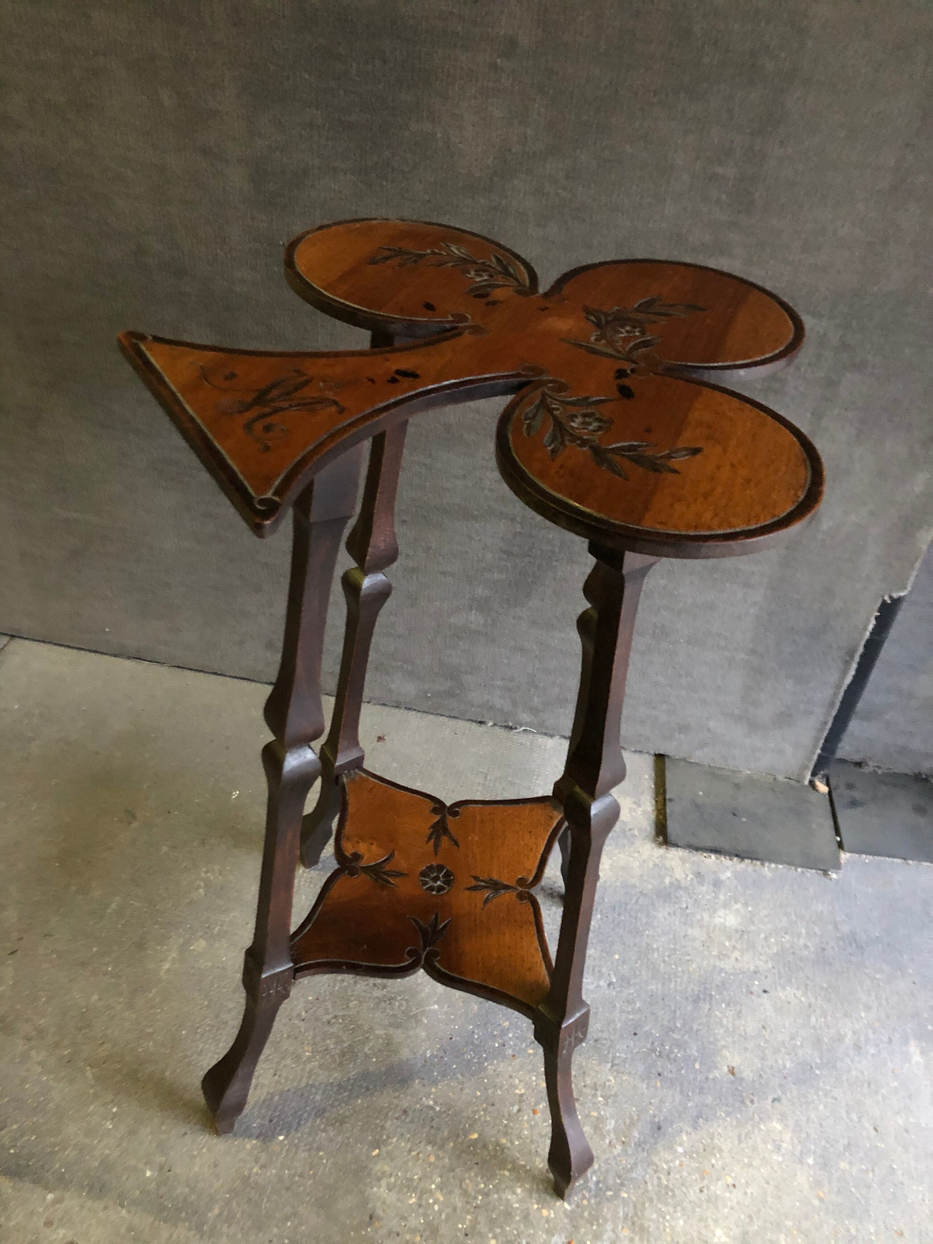 Art nouveau table with a pyrograved decoration