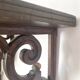 antique oak wall shelf with carved brackets