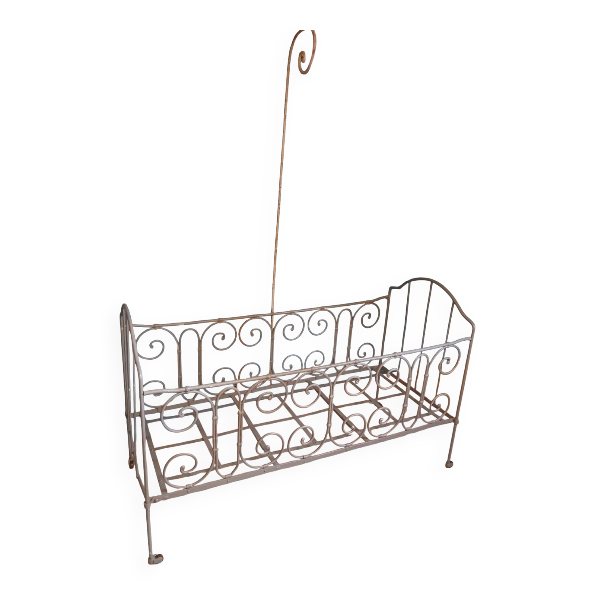 Wrought iron children's bed from the late 19th century.