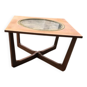 Round glass coffee table with a gold border and brown teak structure, Astro 1960s style.