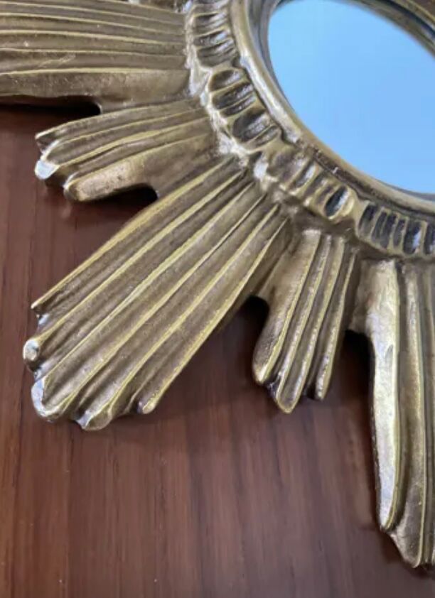 Vintage sun mirror in golden resin 60s/70s