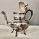 Coffee or tea service monogrammed cr silver metal