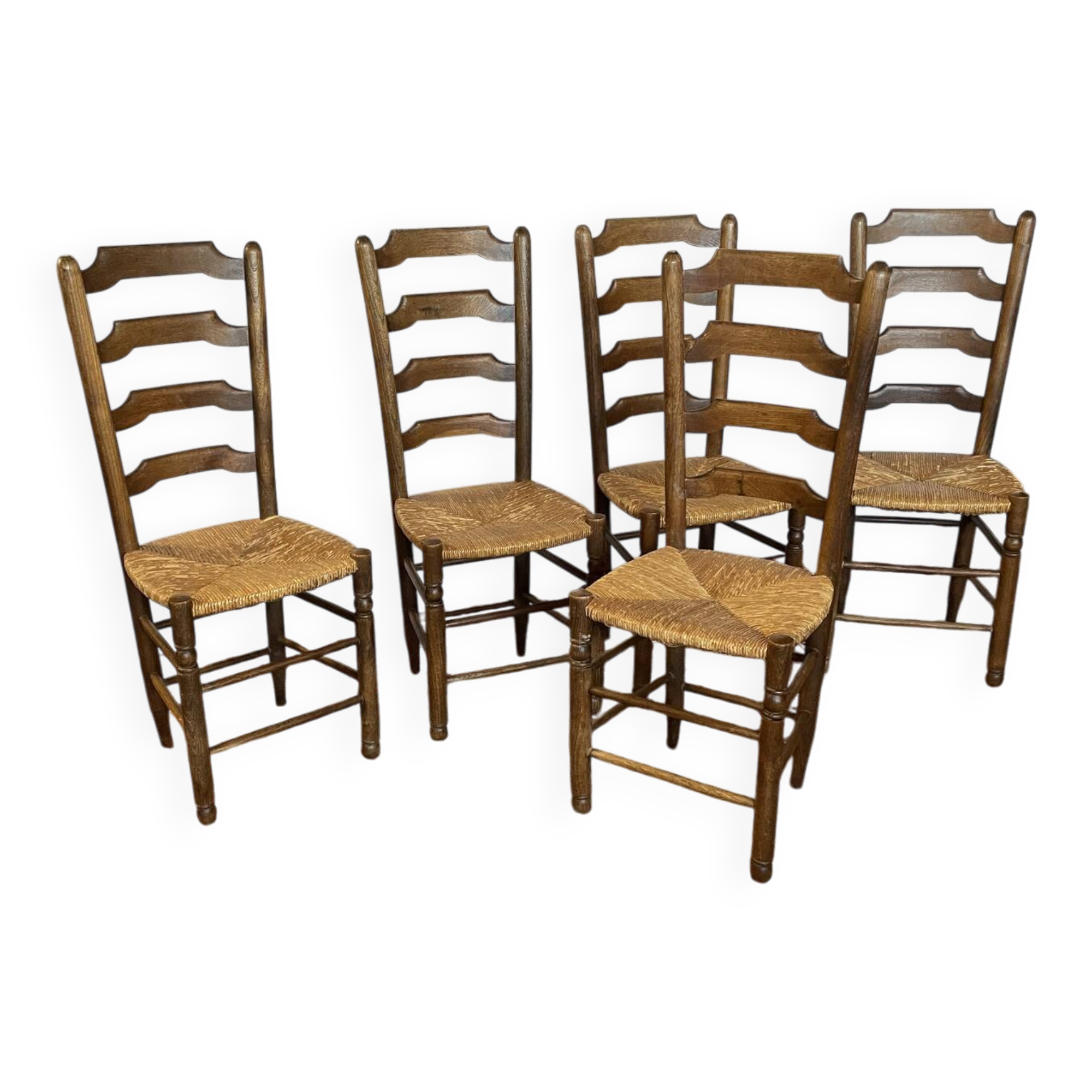 Set of 5 antique oak and straw chairs.