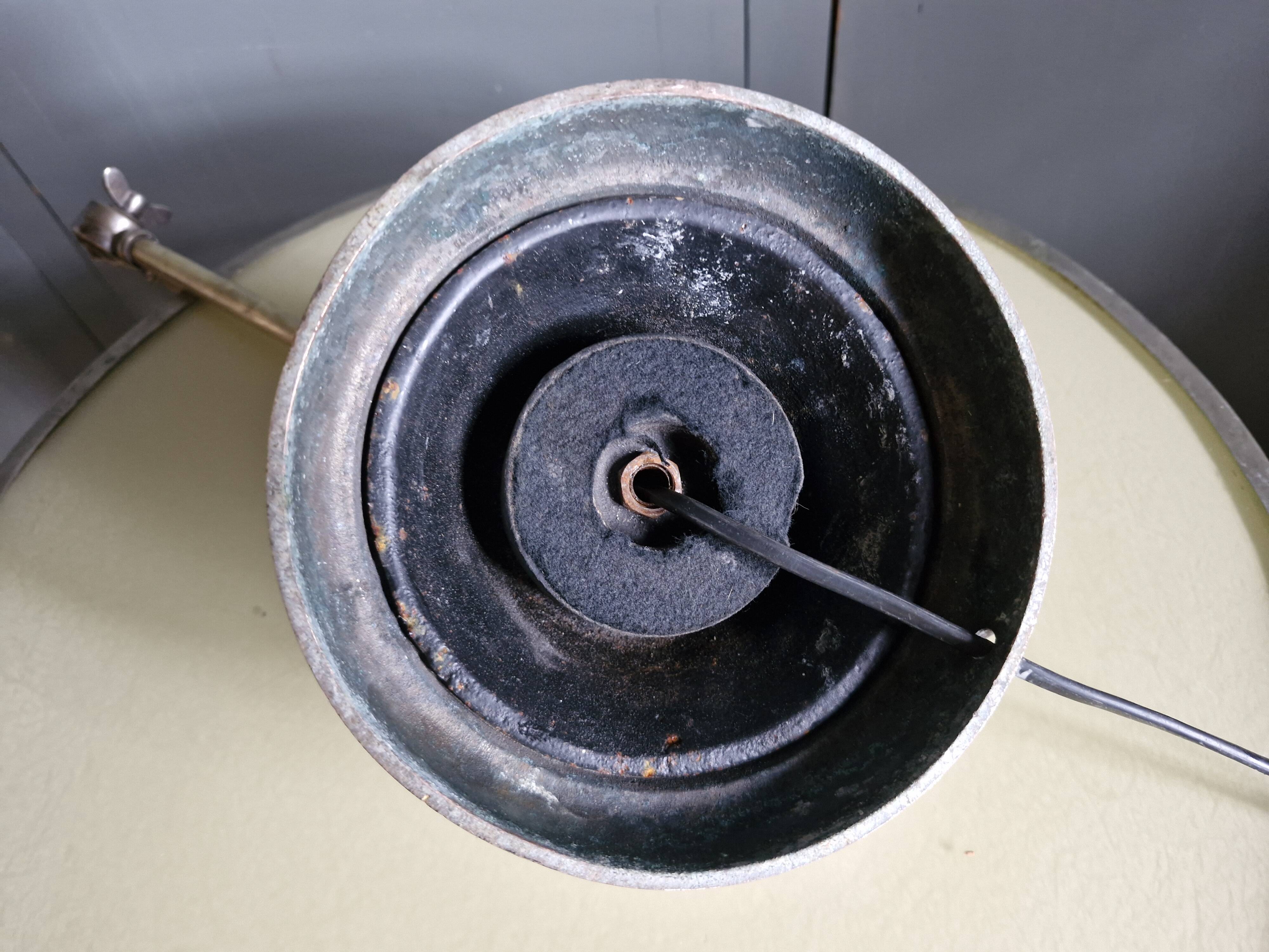Old adjustable industrial lamp in bronze with 2 arms.
