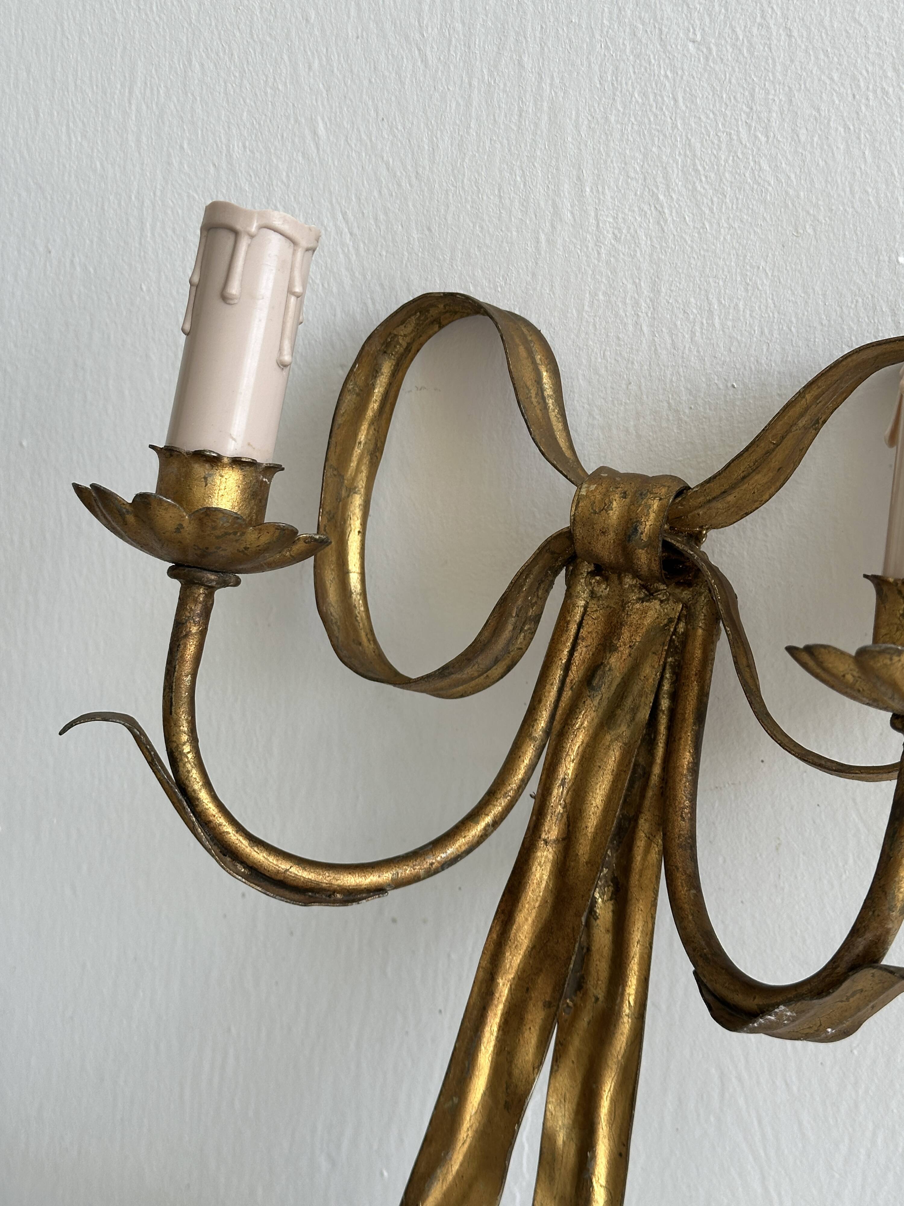 pair of antique metal wall lights