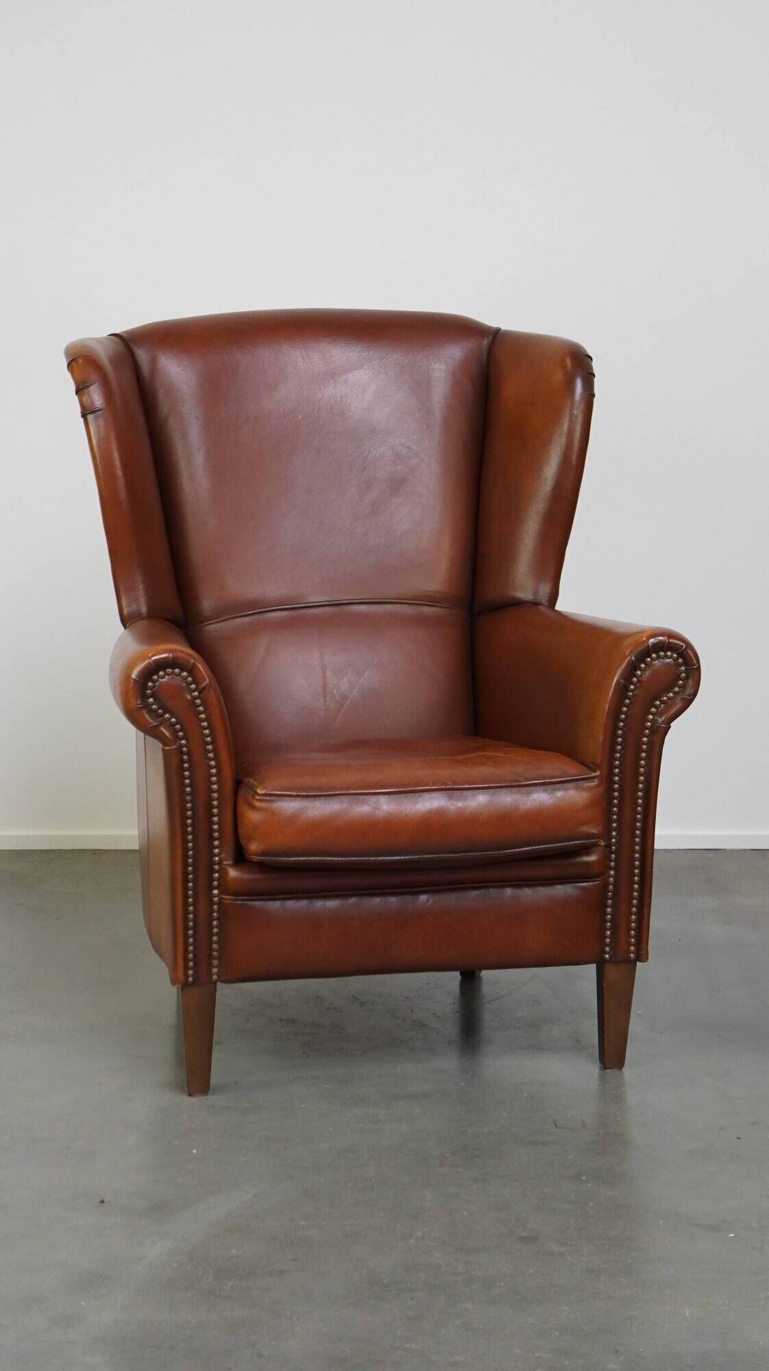 Beautiful classic sheepskin armchair with a beautiful appearance and a comfortable seat