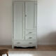 Art Deco wardrobe with shelves and drawers, renovated wood.