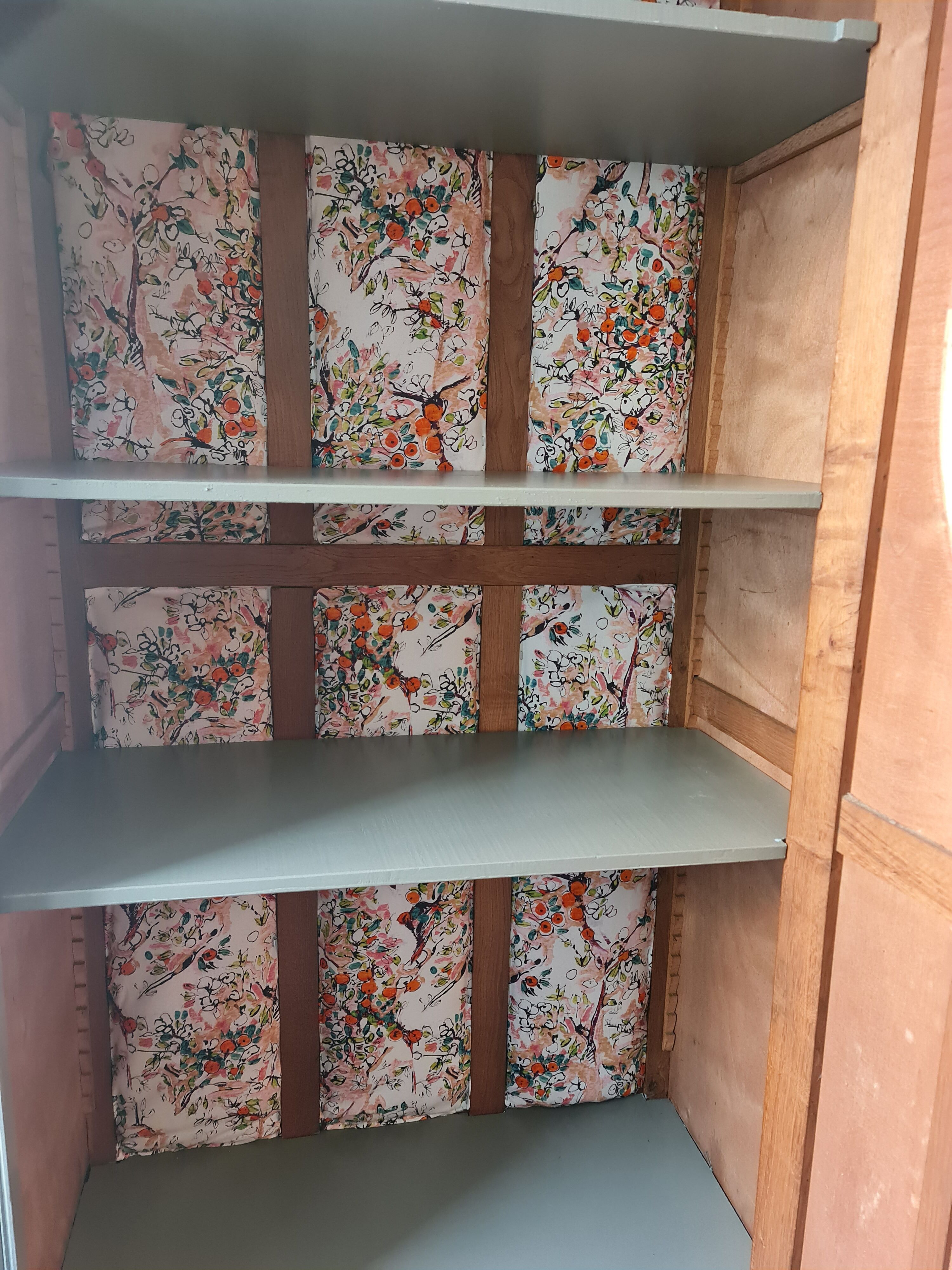 Raw wood lichen cabinet and apple dpie fabrics