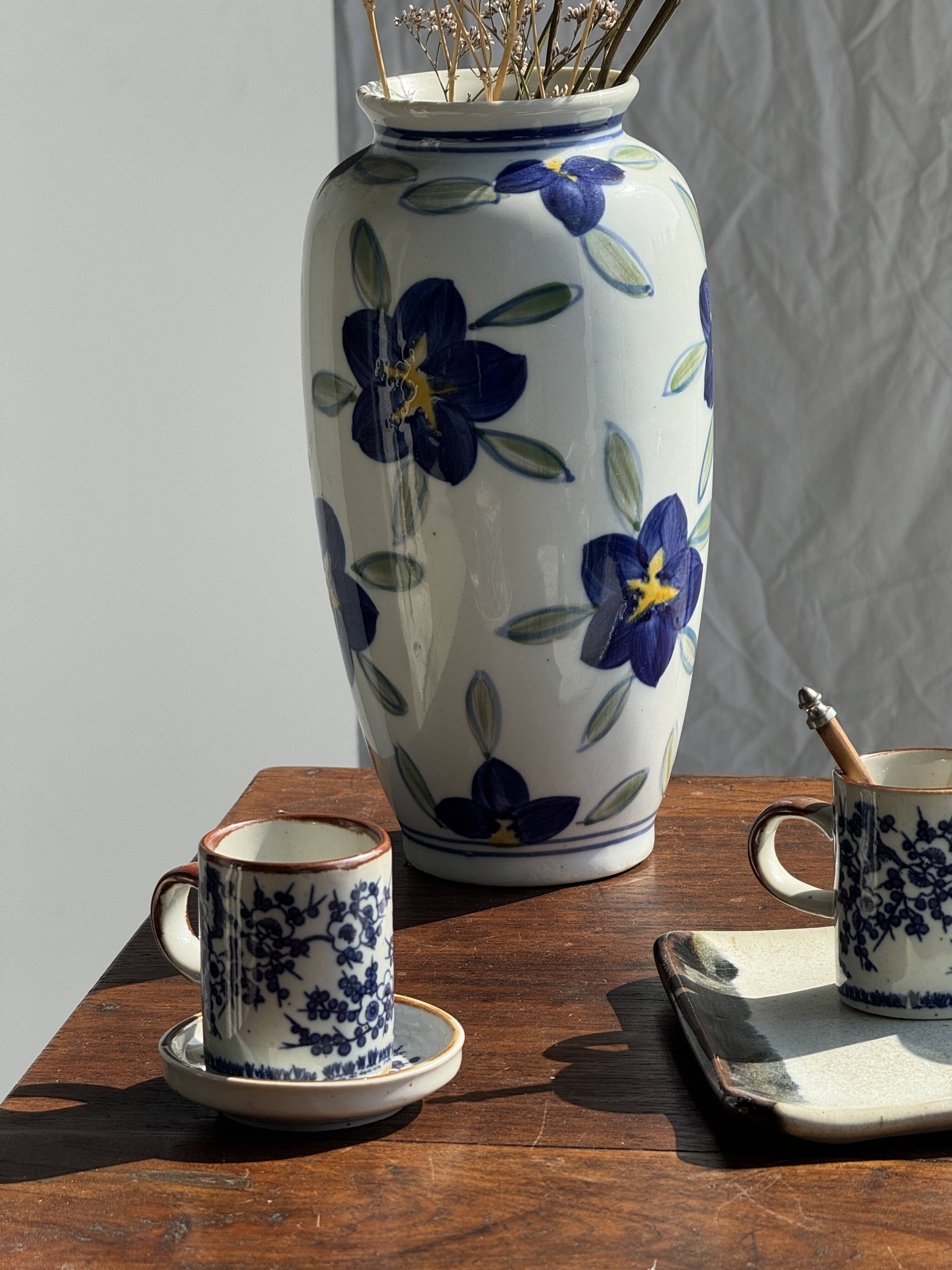 Vase white background stylized blue, yellow and green flowers H24.5 D12