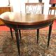 Half-moon table with extensions