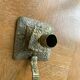 Cellar rat candlestick in gilded brass chised flower pattern, foliage and old face
