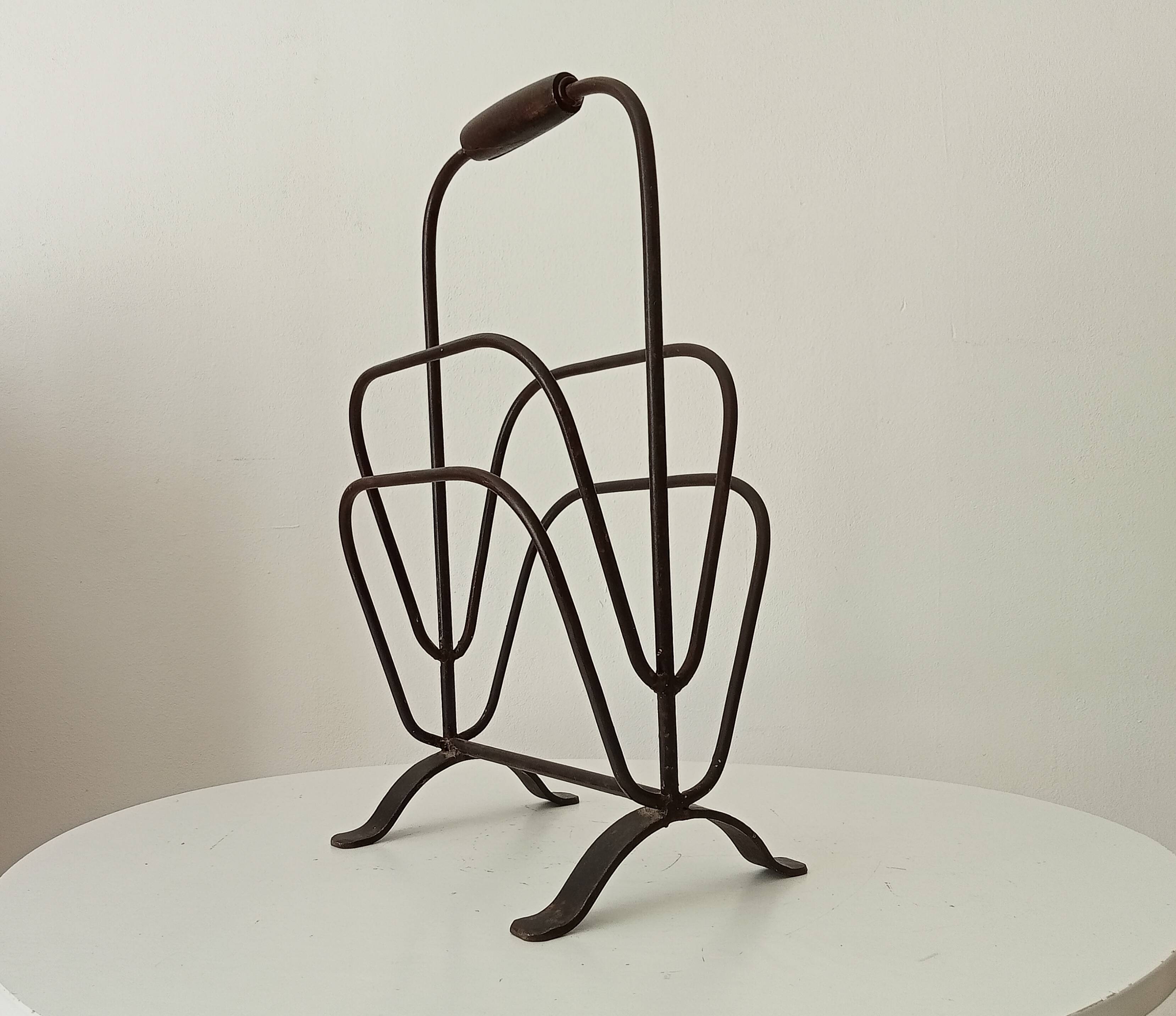 Brutalist wrought iron magazine rack from the 1960s.