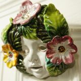 Ceramic mural hoot cherub