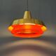 Mid-century Danish style orange brass suspension light.