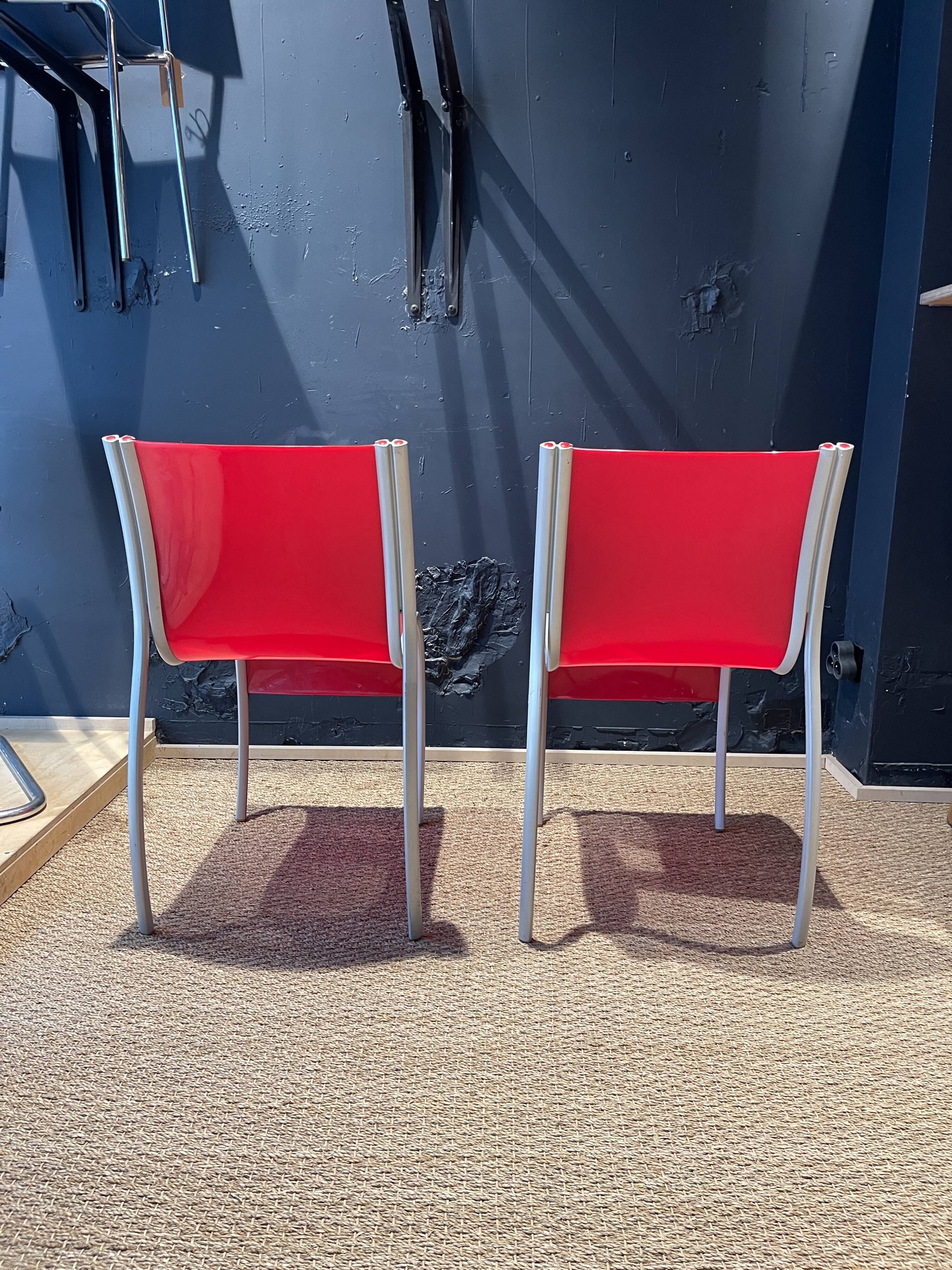 Pair of FPE chairs by Ron Arad for Kartell red Italy 2000s