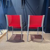 Pair of FPE chairs by Ron Arad for Kartell red Italy 2000s