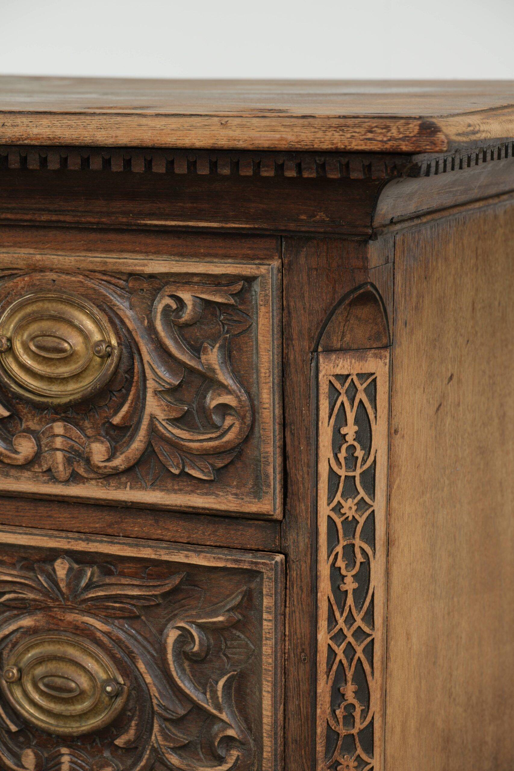 Richly carved English oak chest of drawers from the 18th century