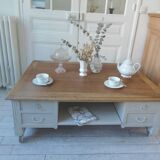 Coffee table on casters, made from an old desk, pearl gray base and belt.