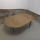 Half-moon extendable oak table for 2 to 8 people.