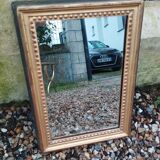 Miroir ancien en bois doré style louis xvi