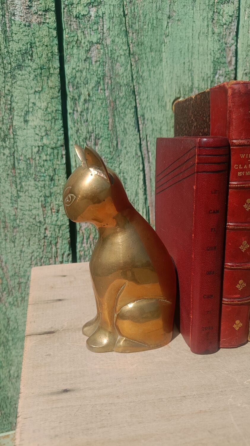 Gold-plated brass bookend cat