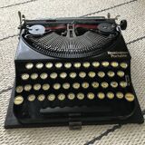 Machine à écrire remington portable en état de marche