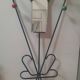 Wall-mounted coat rack with colored balls