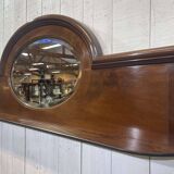English mahogany shelf with its bevelled mirror from the early 20th century.