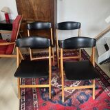 Four black vinyl folding chairs, circa 1960, Scandinavian style, very good condition