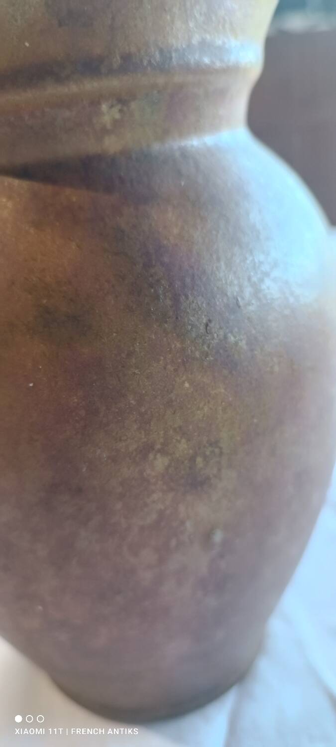 Jug, iridescent glazed stoneware carafe.