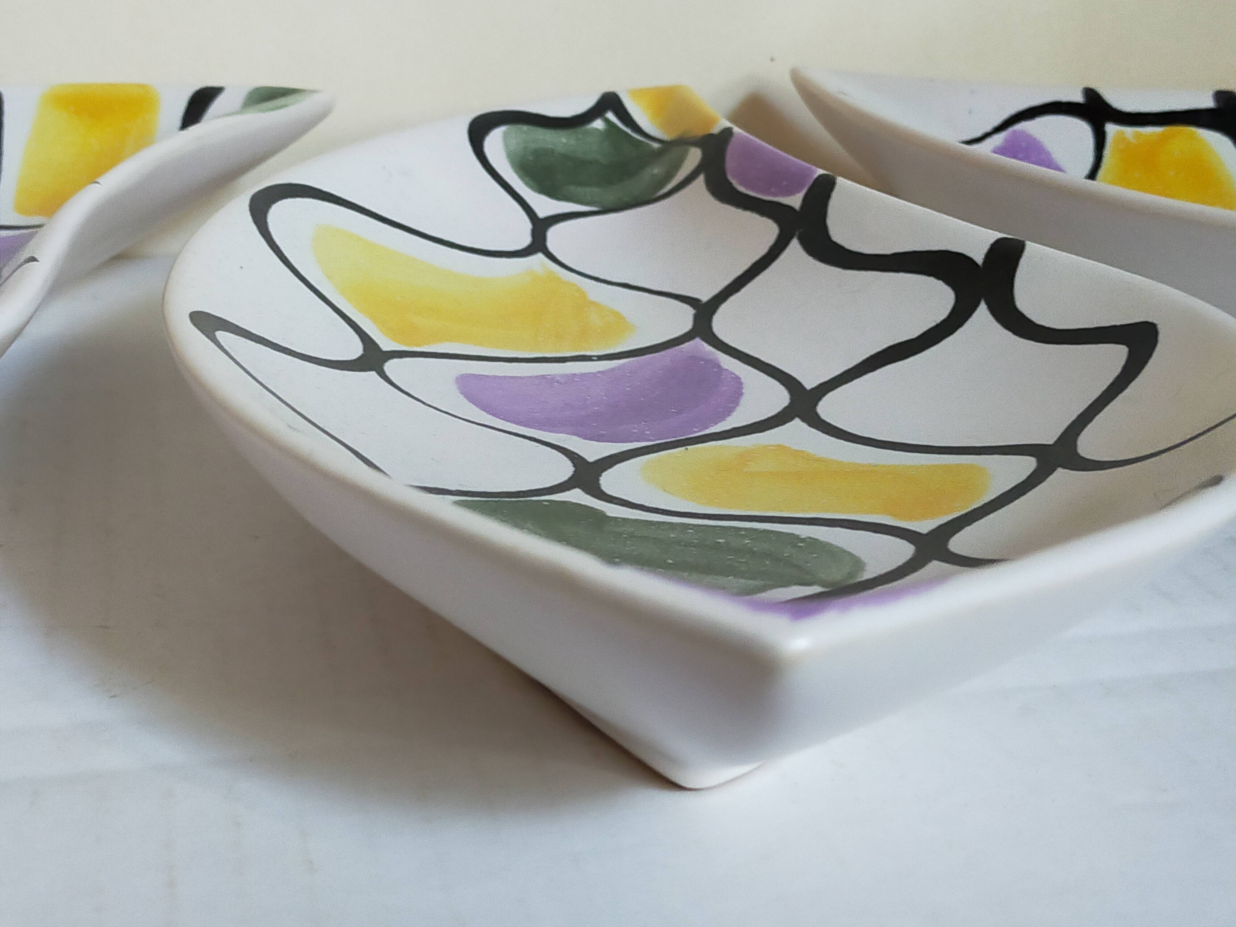 Three vintage free-form ceramic ravine dishes from the 1950s