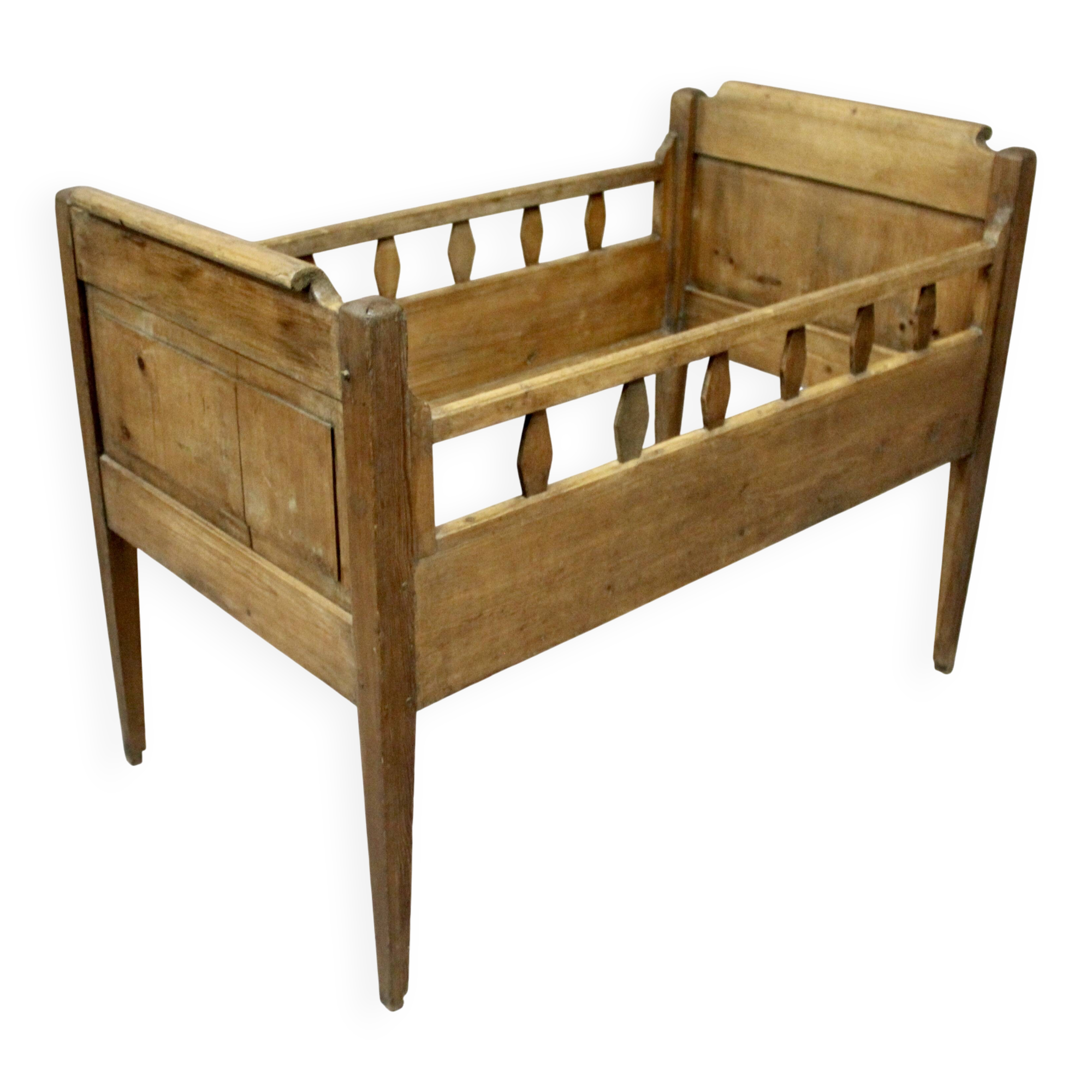 Antique children's bed from the 19th century.