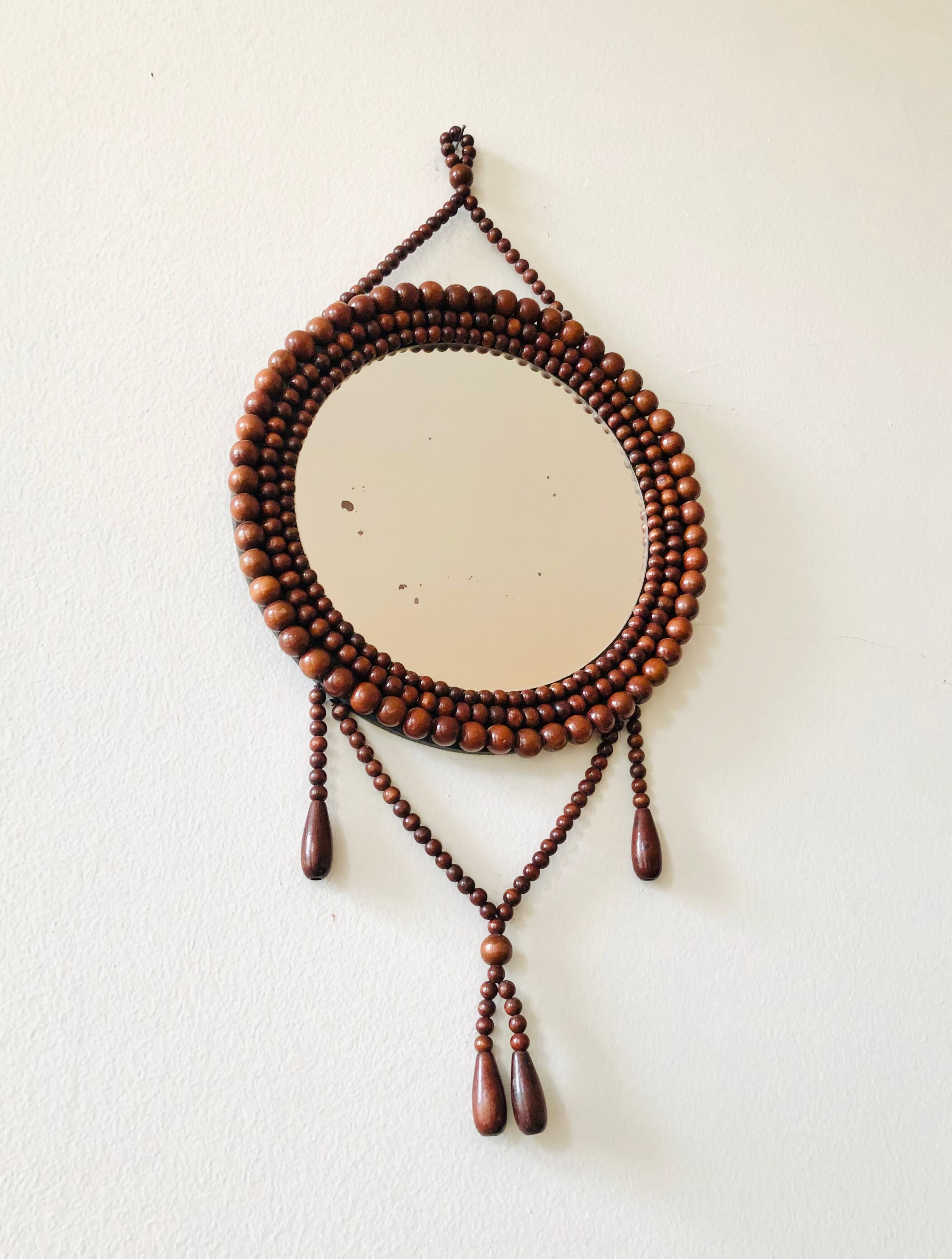Miroir mural vintage en perles de bois
