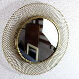Vintage round mirror in gilded metal