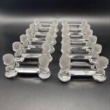 12 Baccarat crystal knife holders, Houdon model, 19th century.