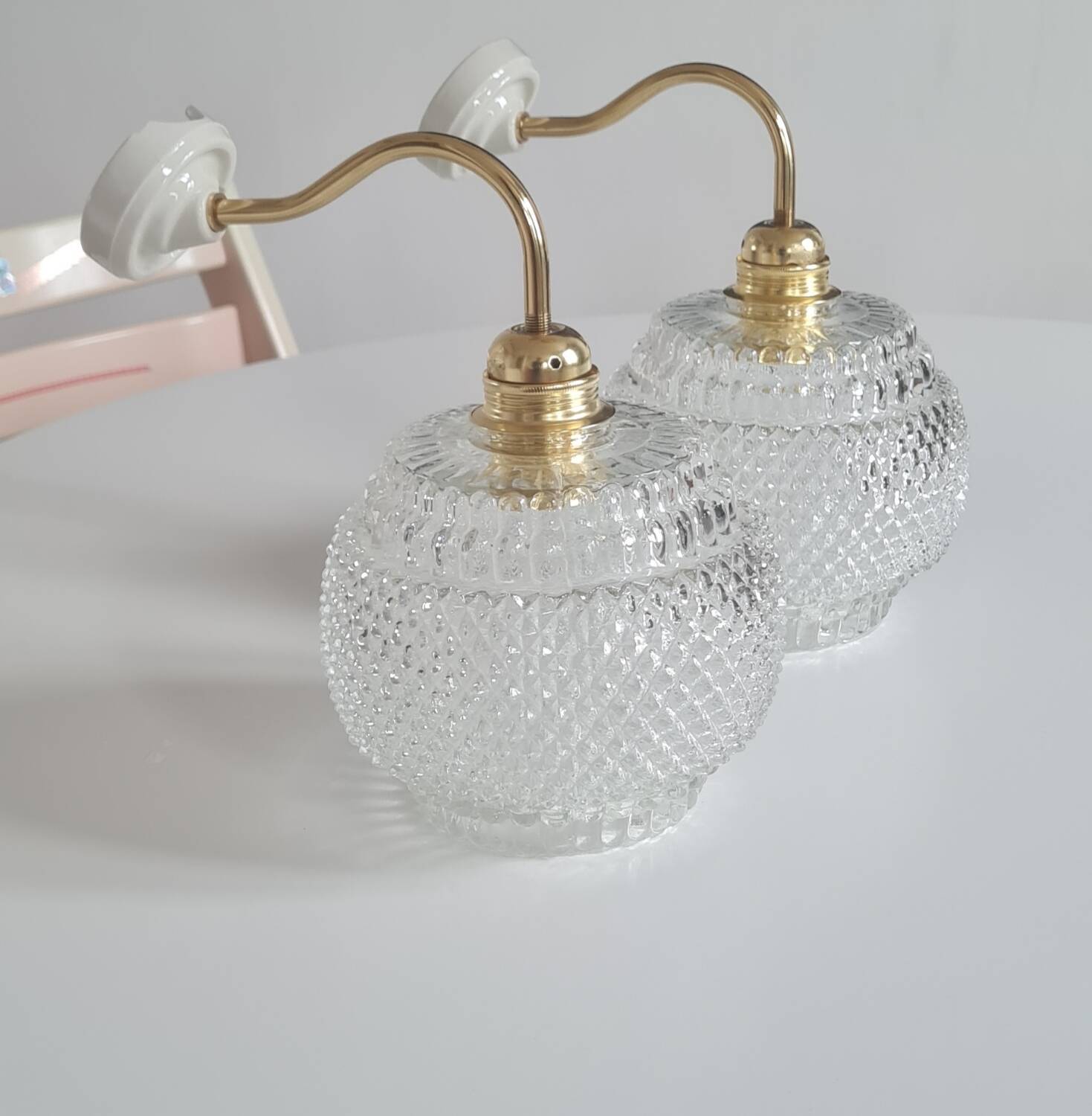 Pair of chiseled glass sconces