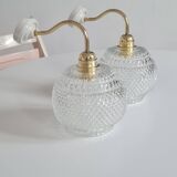 Pair of chiseled glass sconces