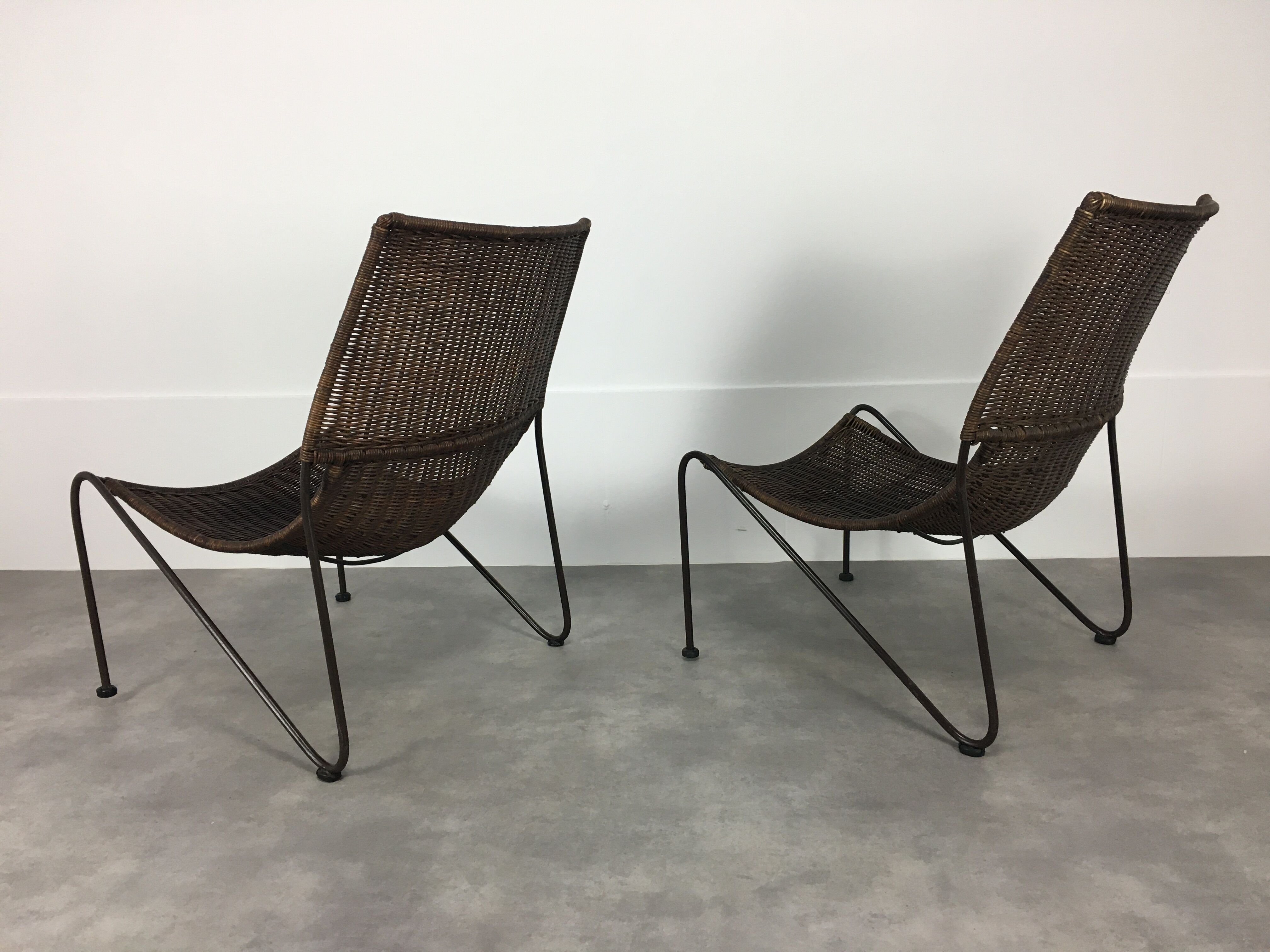 Pair of rattan and steel wire armchairs by frederick weinberg