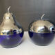 A pair of vintage cobalt glass and silver-plated sugar bowls.