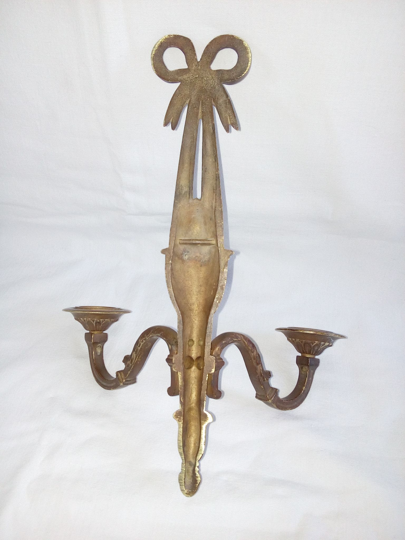 Applique en bronze patiné dans le style Louis XVI ruban