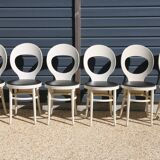 6 baumann chairs, white gull with black faux leather.