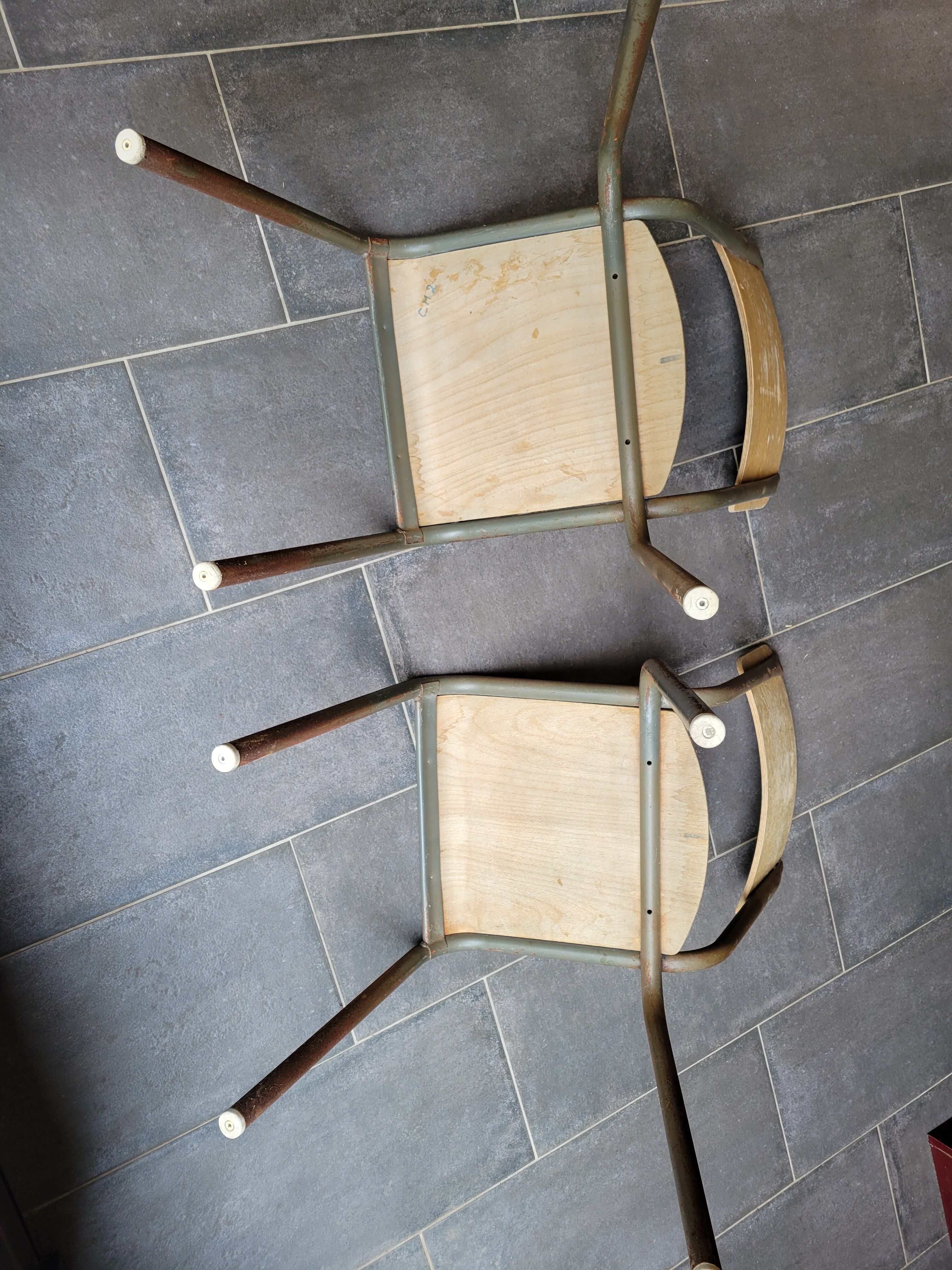 Pair of vintage Mullca school chairs.
