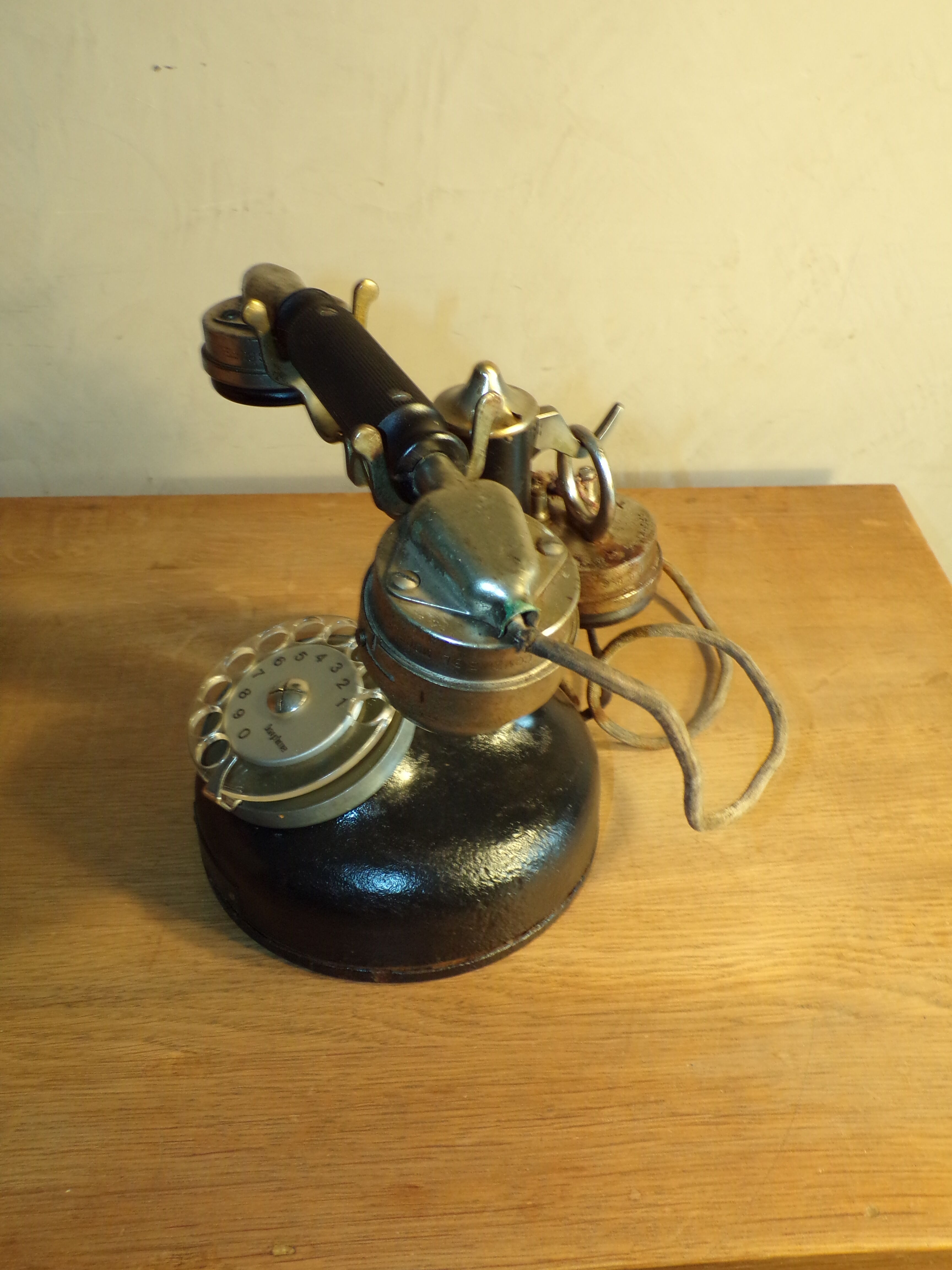 Old Bakelite column and metal phone