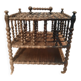 Rosewood magazine rack on casters