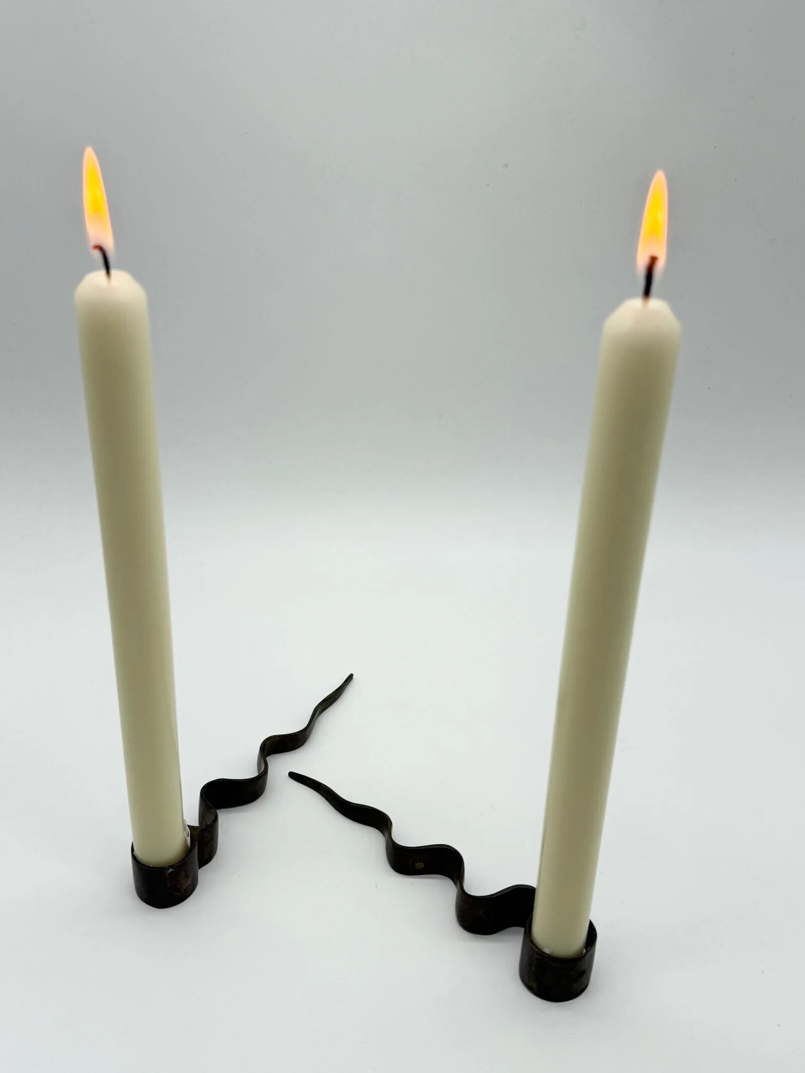 Pair of "Serpentine" candlesticks, modernist, 1970s