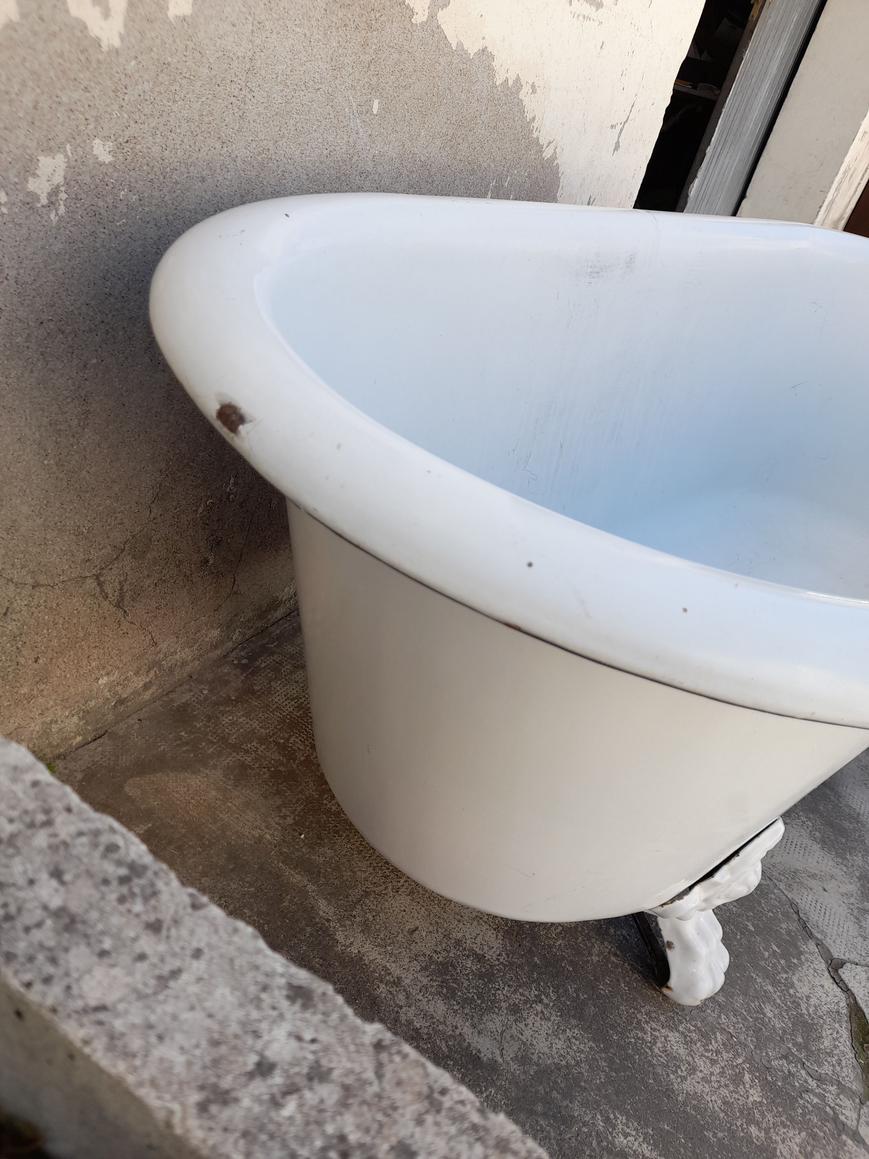 Old enamelled cast bath 19th