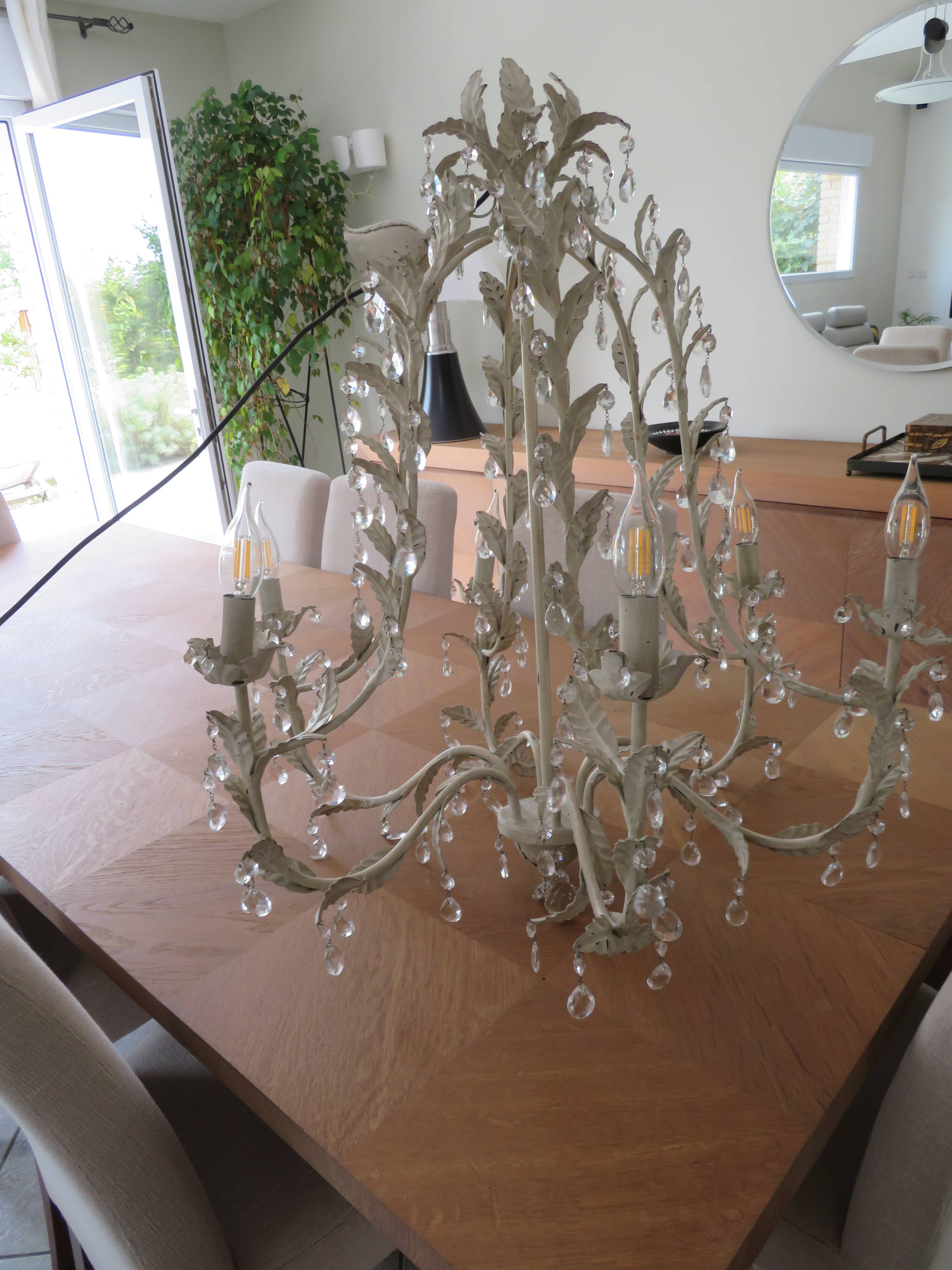 Large cage chandelier in aged metal.
