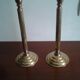 Pair of b-shaped brass legs in the shape of a column